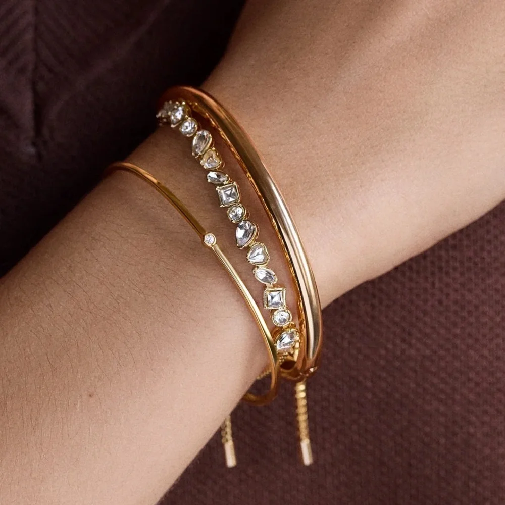 Exquisite tennis style bracelet with asymmetrical cut Swarovski crystals BNIB